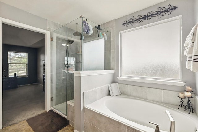 1500 Caymus Ct, Lewisville, TX 75067 - full bath with a shower stall, a bath, and tile patterned floors