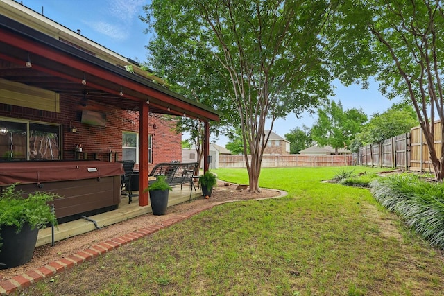 1500 Caymus Ct, Lewisville, TX 75067 - view of yard featuring a hot tub, a ceiling fan, and a patio area