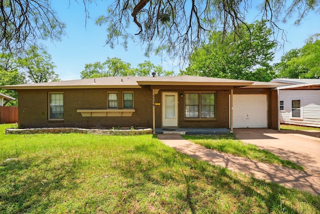 3249 Sandefer St, Abilene, TX 79603 - single story home featuring brick siding, a garage, driveway, and a front lawn
