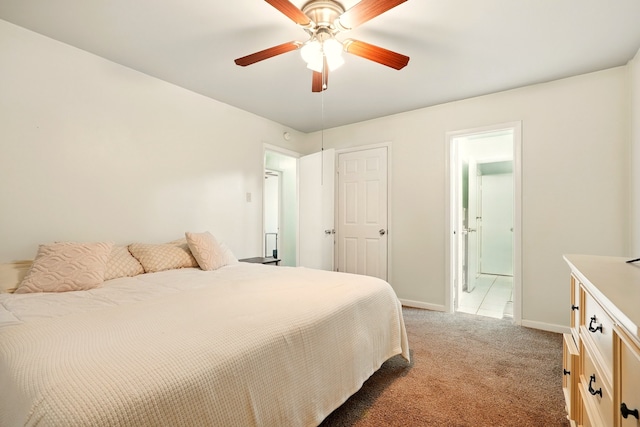 3249 Sandefer St, Abilene, TX 79603 - bedroom with light carpet, baseboards, and ceiling fan
