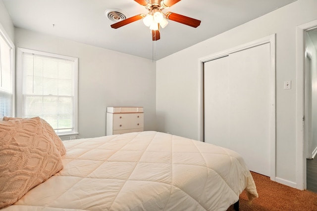 3249 Sandefer St, Abilene, TX 79603 - bedroom with carpet flooring, a closet, and ceiling fan