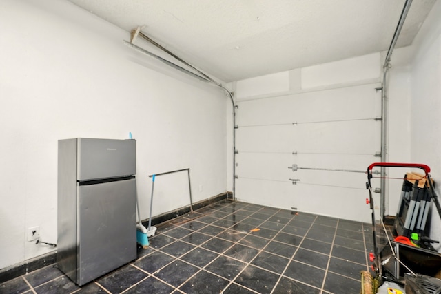 3249 Sandefer St, Abilene, TX 79603 - garage with freestanding refrigerator