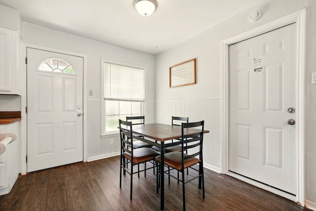 3249 Sandefer St, Abilene, TX 79603 - dining area featuring dark wood-style flooring, plenty of natural light, and wainscoting