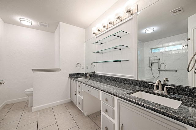 3019 Lela St, Irving, TX 75061 - full bath featuring double vanity, a shower stall, and tile patterned flooring