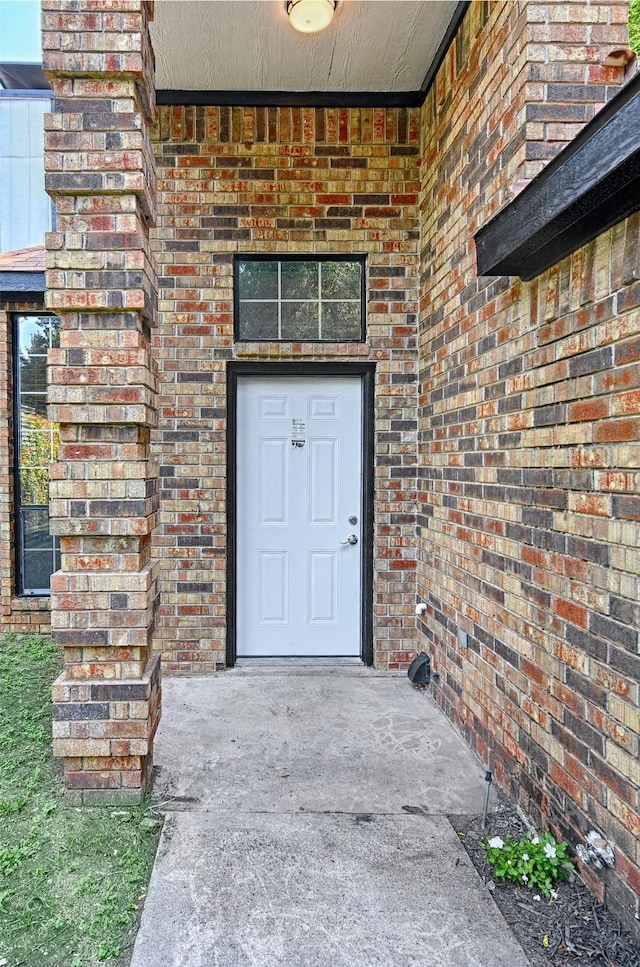 3019 Lela St, Irving, TX 75061 - property entrance featuring brick siding