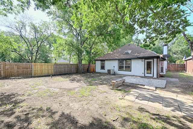 3019 Lela St, Irving, TX 75061 - rear view of property with a fenced backyard and a shingled roof