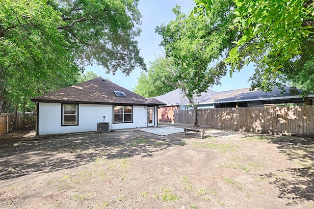 3019 Lela St, Irving, TX 75061 - back of property with a fenced backyard and a patio
