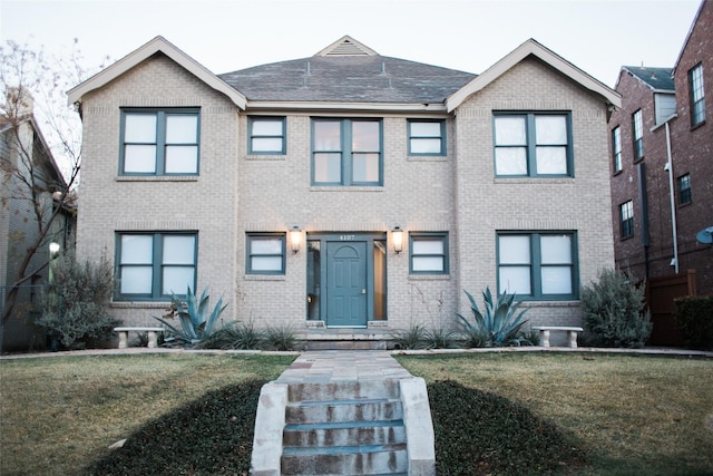 4107 Herschel Ave, Dallas, TX 75219 - view of front facade featuring brick siding and a front yard
