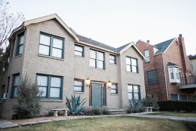 4107 Herschel Ave, Dallas, TX 75219 - view of front of house featuring brick siding and a front lawn