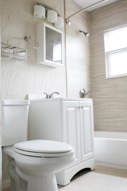 4107 Herschel Ave, Dallas, TX 75219 - bathroom with toilet and shower / bath combination