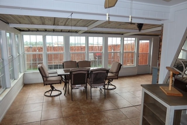 3035 Briarwood Dr, Paris, TX 75460 - sunroom / solarium with tile patterned floors and beamed ceiling