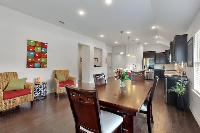 691 Hobie Point Dr, Lewisville, TX 75056 - dining space featuring dark wood-style flooring, baseboards, recessed lighting, and lofted ceiling