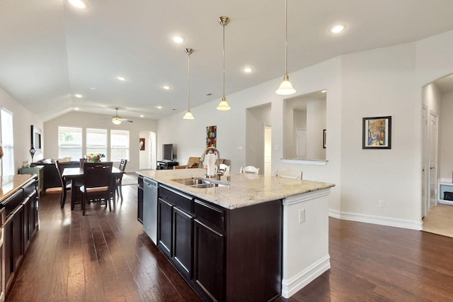 691 Hobie Point Dr, Lewisville, TX 75056 - kitchen featuring a sink, arched walkways, dishwasher, ceiling fan, and lofted ceiling