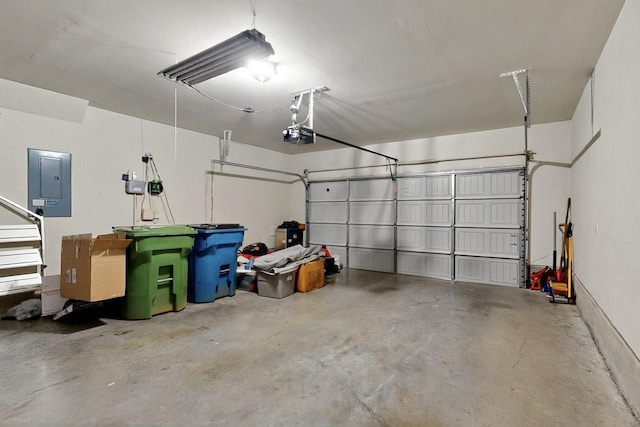 691 Hobie Point Dr, Lewisville, TX 75056 - garage featuring electric panel and a garage door opener
