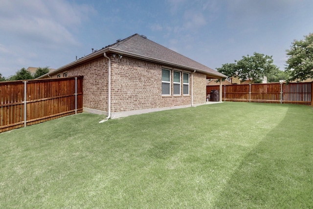 691 Hobie Point Dr, Lewisville, TX 75056 - back of house with brick siding and a shingled roof
