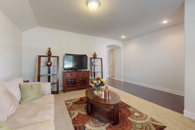 691 Hobie Point Dr, Lewisville, TX 75056 - living room with arched walkways, baseboards, recessed lighting, wood finished floors, and vaulted ceiling