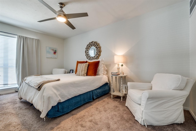 5927 E University Blvd Unit 217, Dallas, TX 75206 - carpeted bedroom with a ceiling fan