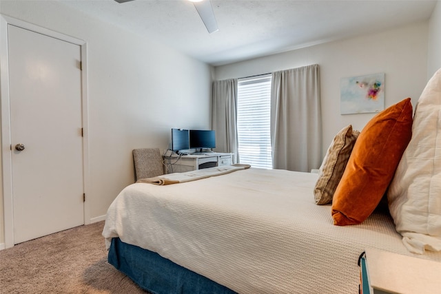 5927 E University Blvd Unit 217, Dallas, TX 75206 - bedroom featuring carpet flooring and a ceiling fan