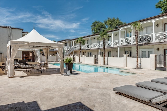 5927 E University Blvd Unit 217, Dallas, TX 75206 - view of swimming pool featuring a gazebo and a patio area