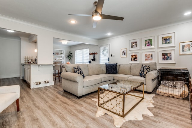 5927 E University Blvd Unit 217, Dallas, TX 75206 - living room with ornamental molding, light wood-style floors, a ceiling fan, recessed lighting, and bar