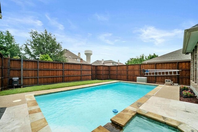 2425 Sir Lovel Ln, Lewisville, TX 75056 - view of swimming pool with a fenced backyard