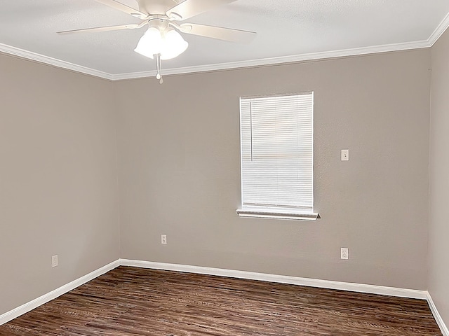6021 Fm 3054, Malakoff, TX 75148 - empty room with dark wood finished floors, crown molding, baseboards, and ceiling fan