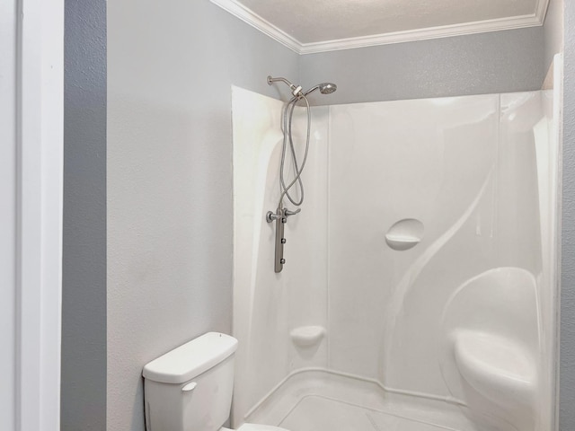6021 Fm 3054, Malakoff, TX 75148 - bathroom featuring crown molding, toilet, and a shower