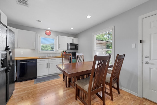 1025 N 32nd St, Waco, TX 76707 - dining space with plenty of natural light, light wood-type flooring, and recessed lighting