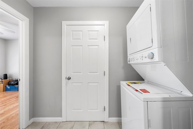 1025 N 32nd St, Waco, TX 76707 - laundry room with estacked washer and dryer and baseboards
