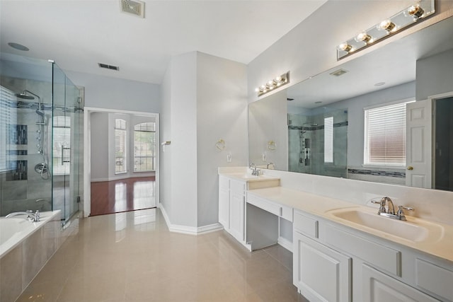 518 Hawthorne Dr, Murphy, TX 75094 - bathroom featuring double vanity, a shower stall, and tile patterned floors