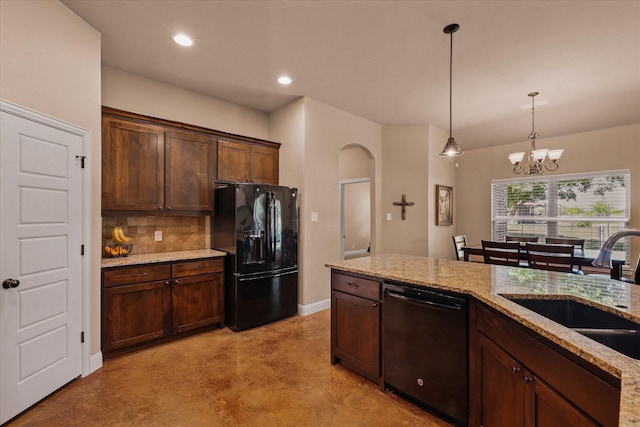 5861 Hayes Rd, Midlothian, TX 76065 - kitchen featuring black appliances, a sink, arched walkways, tasteful backsplash, and a chandelier