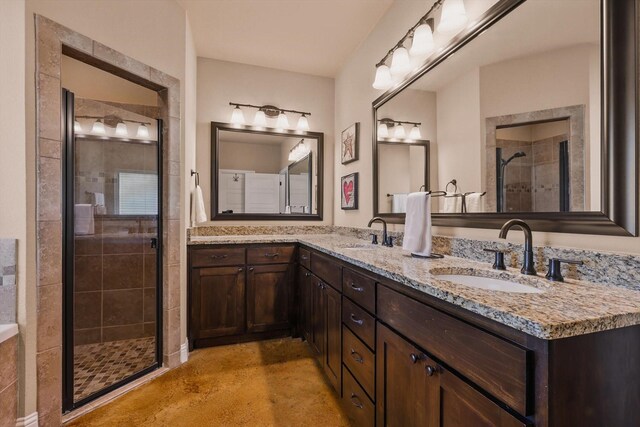 5861 Hayes Rd, Midlothian, TX 76065 - full bathroom featuring a stall shower, double vanity, and finished concrete floors