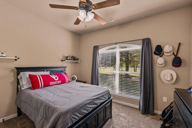 5861 Hayes Rd, Midlothian, TX 76065 - carpeted bedroom with baseboards and ceiling fan