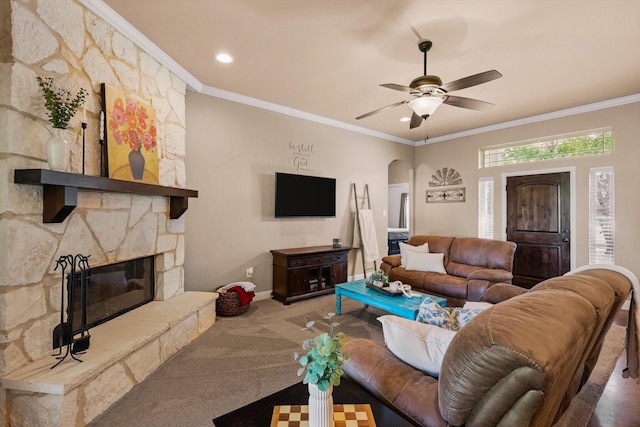 5861 Hayes Rd, Midlothian, TX 76065 - carpeted living area with ceiling fan, arched walkways, crown molding, baseboards, and recessed lighting