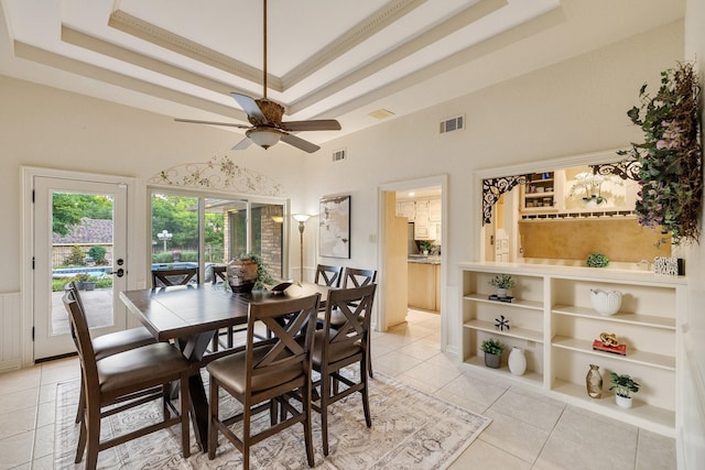 201 Split Rock Ter, Ovilla, TX 75154 - dining area with a raised ceiling, a towering ceiling, ceiling fan, and light tile patterned floors