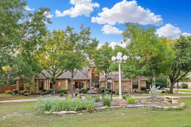 201 Split Rock Ter, Ovilla, TX 75154 - view of front of property featuring stone siding and a front lawn