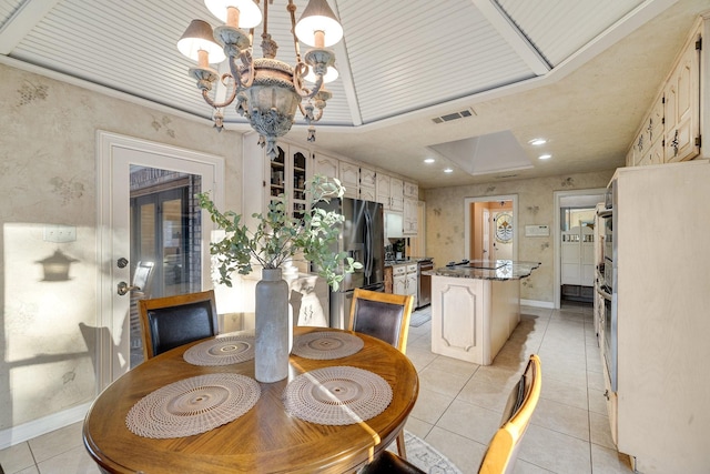 201 Split Rock Ter, Ovilla, TX 75154 - dining area featuring a chandelier, light tile patterned floors, baseboards, and wallpapered walls
