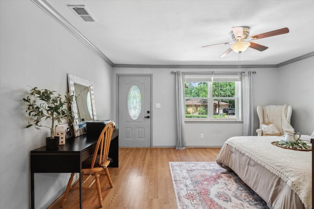 809 S Prairieville St, Athens, TX 75751 - entryway featuring a ceiling fan, ornamental molding, light wood finished floors, and baseboards