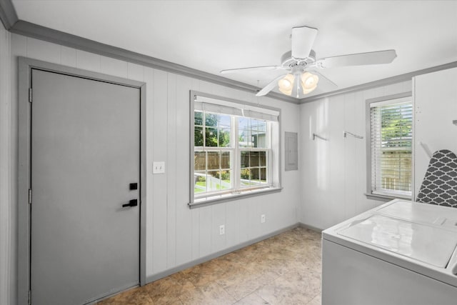 809 S Prairieville St, Athens, TX 75751 - washroom with ornamental molding, electric panel, baseboards, ceiling fan, and washing machine and clothes dryer
