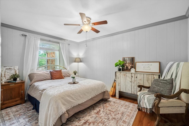 809 S Prairieville St, Athens, TX 75751 - bedroom with crown molding, wood finished floors, and ceiling fan