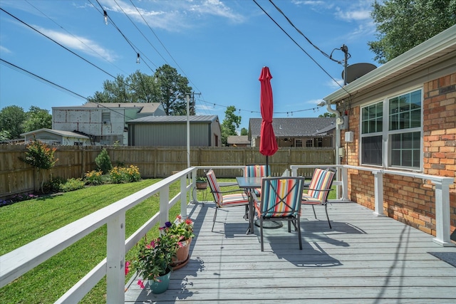 809 S Prairieville St, Athens, TX 75751 - wooden deck with outdoor dining space