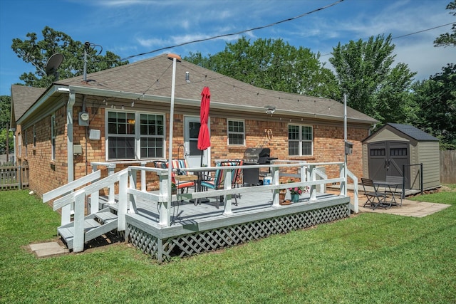 809 S Prairieville St, Athens, TX 75751 - rear view of property featuring roof with shingles, a wooden deck, and brick siding