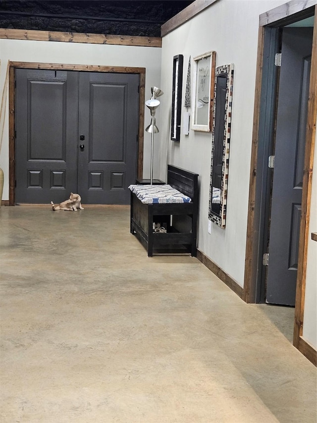 13597 County Road 35, Tyler, TX 75706 - corridor featuring concrete flooring and baseboards
