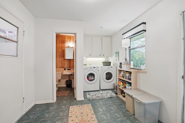 3720 Wharton Dr, Fort Worth, TX 76133 - washroom featuring cabinet space, separate washer and dryer, and baseboards