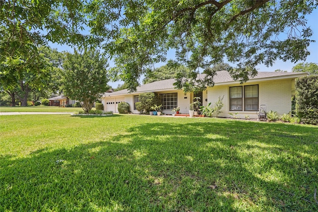 3720 Wharton Dr, Fort Worth, TX 76133 - single story home featuring a garage, a front lawn, and brick siding