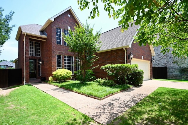 2904 Waterford Dr, Irving, TX 75063 - traditional home featuring brick siding, a shingled roof, and driveway