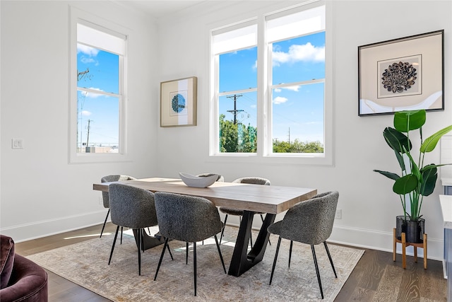 201 Carroll St, Fort Worth, TX 76107 - dining area featuring dark wood-type flooring and baseboards