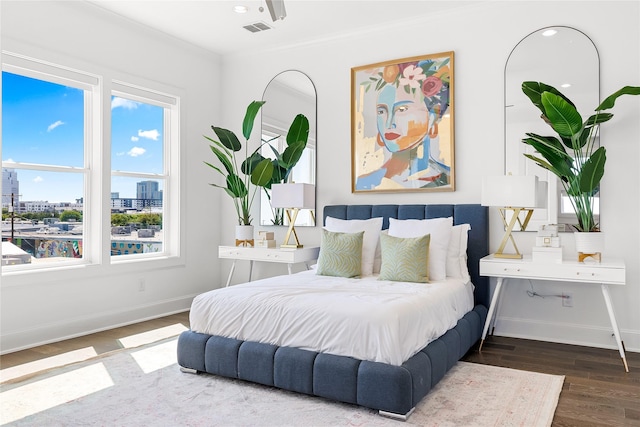 201 Carroll St, Fort Worth, TX 76107 - bedroom with a city view, wood finished floors, multiple windows, baseboards, and recessed lighting