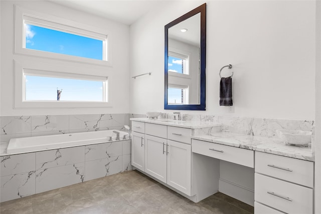 201 Carroll St, Fort Worth, TX 76107 - bathroom featuring vanity, healthy amount of natural light, and a garden tub