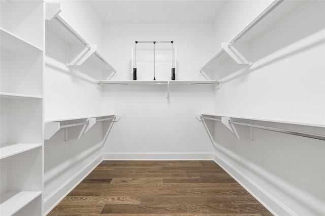 201 Carroll St, Fort Worth, TX 76107 - walk in closet featuring wood finished floors